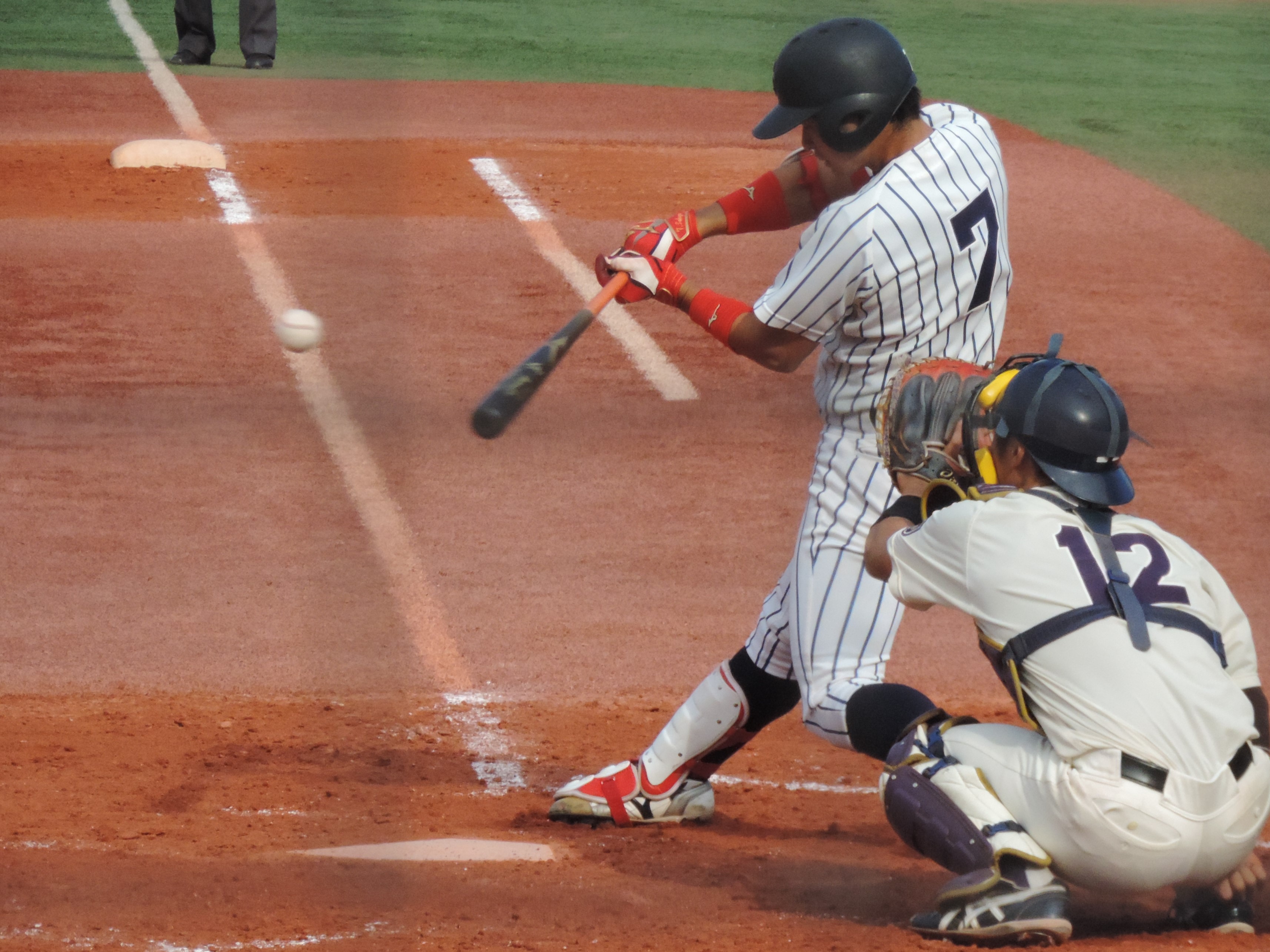 佐藤拓が初回、中前打.JPG