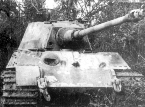 Tiger_II_punctured_in_front_turret.jpg